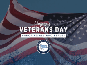 Flag waving in background of Happy Veterans Day message from ILA South Atlantic and Gulf Coast District